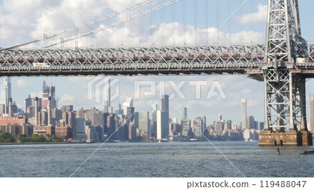 New York City skyline from ferry boat. Manhattan midtown, East river, Williamsburg Bridge, USA. 119488047