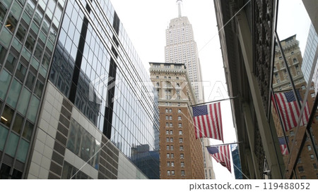 New York, american flag. Empire State building. Manhattan midtown city street banner, patriotism. New York, american flag. Empire State building. Manhattan midtown city street banner, patriotism. 119488052