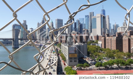 Brooklyn Bridge from Manhattan Bridge. New York City downtown skyline, financial district cityscape. Brooklyn Bridge from Manhattan Bridge. New York City downtown skyline, financial district cityscape. 119488102