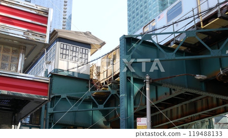 New York elevated subway, metropolitan bridge, metro track above street. Railway transport over road 119488133