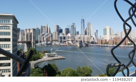 Brooklyn Bridge from Manhattan Bridge. New York City downtown skyline, financial district cityscape. 119488207