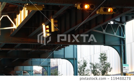 New York elevated subway, metropolitan bridge, metro track above street. Railway transport over road New York elevated subway, metropolitan bridge, metro track above street. Railway transport over road 119488278