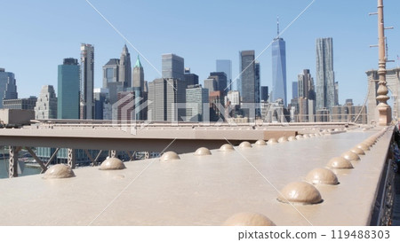 Brooklyn Bridge to Manhattan downtown. New York City skyline cityscape. World Trade Center, USA. Brooklyn Bridge to Manhattan downtown. New York City skyline cityscape. World Trade Center, USA. 119488303