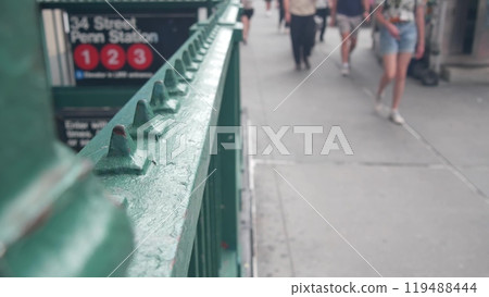 New York subway sign, underground metro station. Metropolitan entrance fence, 34 street Penn Station 119488444