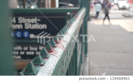 New York subway sign, underground metro station. Metropolitan entrance fence, 34 street Penn Station 119488461