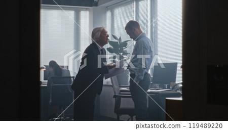 Senior team leader with papers loses temper and yells at male company employee Senior team leader with papers loses temper and yells at male company employee 119489220
