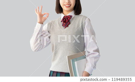 Exam takers and female high school students in uniform making peace signs 119489355