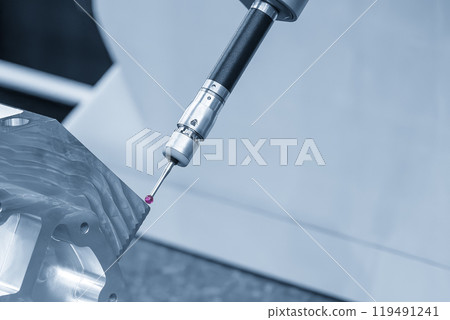 The multi axis CMM machine measuring the aluminum cylinder block parts . 119491241