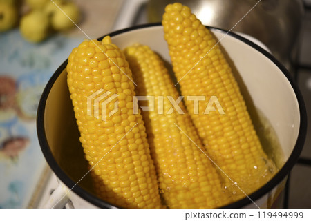 Cooking corn on the cob. A delicacy made of corn. Cooking corn on the cob. A delicacy made of corn. 119494999