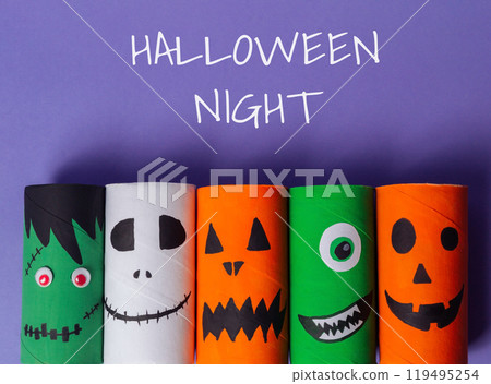 Group of paper tubes with Halloween faces on them Group of paper tubes with Halloween faces on them 119495254