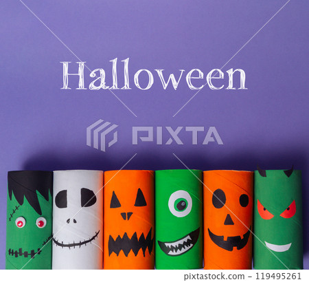 Group of paper tubes with Halloween faces on them 119495261
