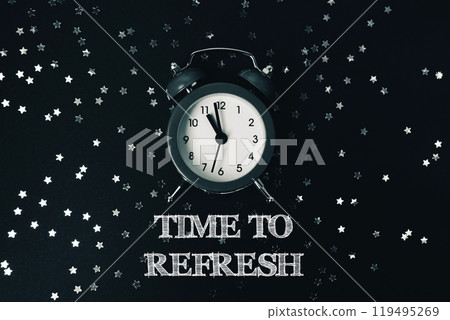 Clock and speech bubble with time to refresh text on a starry night background 119495269