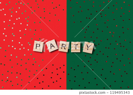 A green and red background with a word party written in wooden blocks 119495343