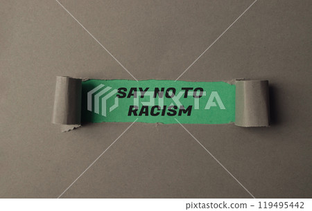 Torn piece of paper with the words Say No to Racism written on it Torn piece of paper with the words Say No to Racism written on it 119495442