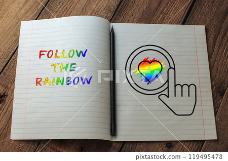 Notebook with rainbow colors and a heart drawn on it 119495478