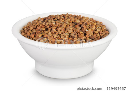 Raw buckwheat in ceramic bowl isolated on white background 119495667