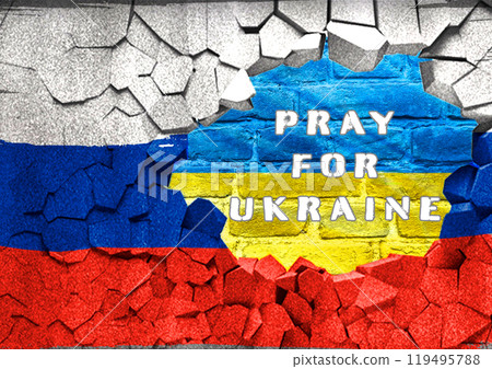 Flag with the word pray for Ukraine written on it 119495788