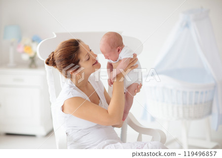 Young mother with newborn baby. Young mother with newborn baby. 119496857