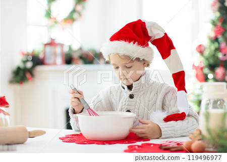 Family baking Christmas cookies. Kids Xmas fun. Family baking Christmas cookies. Kids Xmas fun. 119496977