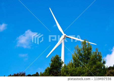 Windmills for the production of electric energy. Wind farm of renewable, alternative and sustainable energy, province of Barcelona 119497556