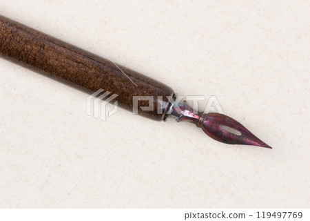 Fountain pen on an antique textured paper. Fountain pen on an antique textured paper. 119497769