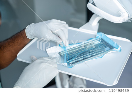 Dental tray with essential dentist equipment 119498489