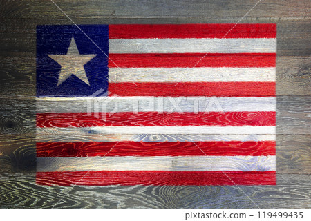 Liberia flag on rustic old wood surface background Liberia flag on rustic old wood surface background 119499435