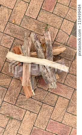 Firewood stacked in a grid pattern Firewood stacked in a grid pattern 119499484