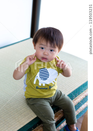 Smiling 2-year-old boy 119503231