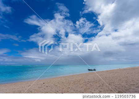 Tourists paragliding over turquoise waters. Ile Aux Cerfs, Mauritius. 119503736