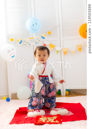 Boy wearing hakama celebrating his first birthday, 1 year old Boy wearing hakama celebrating his first birthday, 1 year old 119503899