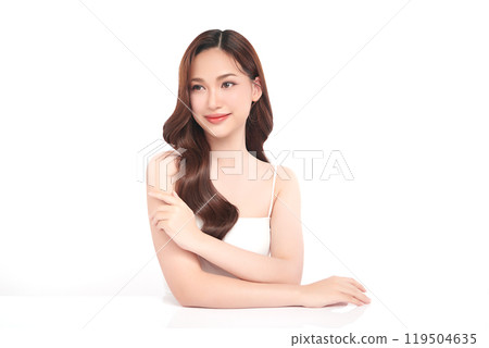 Beautiful young asian woman with clean fresh skin on white background, Face care, Facial treatment, Cosmetology, beauty and spa, Asian women portrait. Beautiful young asian woman with clean fresh skin on white background, Face care, Facial treatment, Cosmetology, beauty and spa, Asian women portrait. 119504635