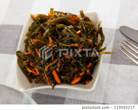 Sea kale salad with carrots served in bowl Sea kale salad with carrots served in bowl 119505217