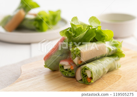 Vegetable Salad Rolls with Crab stick and Vietnamese Sausage,with seafood sauce dipping. 119505275