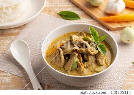 Green Curry with duck meat.Thai sliced duck breast with green curry paste and coconut milk in white bowl ,thai food ,Gaeng Kiew Wan Green Curry with duck meat.Thai sliced duck breast with green curry paste and coconut milk in white bowl ,thai food ,Gaeng Kiew Wan 119505314