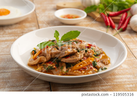 Stir Fried slice duck breast meat with Thai Basil leave in white plate.asian spicy food. 119505316