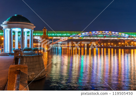 Pushkinskiy bridge with night illumination. Bridge to Gorky Park. Pushkinskiy bridge with night illumination. Bridge to Gorky Park. 119505450