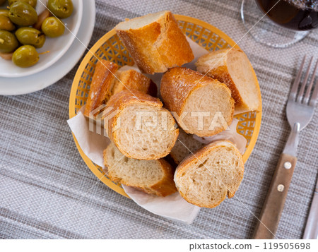 Bread sliced and served on table Bread sliced and served on table 119505698