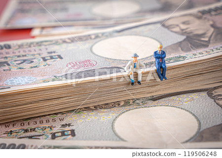 Money and miniature men and women business image 119506248