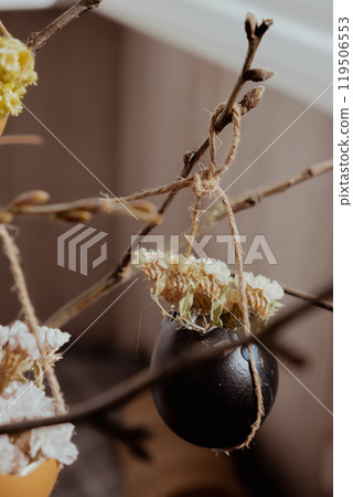 Tutorial How to make Easter table decoration with egg shells step by step instruction. Easter home decoration on wooden branch. Seasonal sustainable recycled 119506553