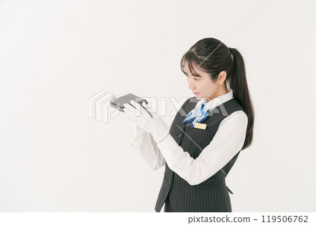 Woman appraising a wallet 119506762