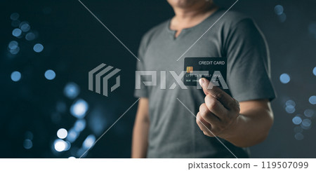 businessman showing a mock-up credit card for business and shopping to make payment and smartphone.half body. purchase, commerce, financial, card, money, using technology. selective focus. businessman showing a mock-up credit card for business and shopping to make payment and smartphone.half body. purchase, commerce, financial, card, money, using technology. selective focus. 119507099