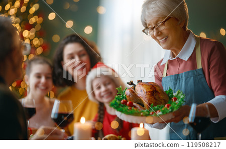 family celebrating Christmas family celebrating Christmas 119508217