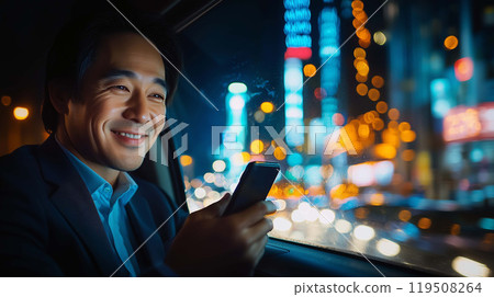 Productive Moments, Asian Businessman Using His Phone Inside His Vehicle 119508264