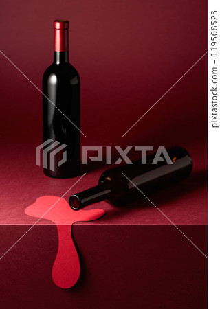 Bottles of red wine on a red background. 119508523