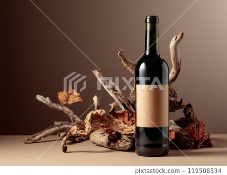 Bottle of red wine with a composition of old wood. 119508534