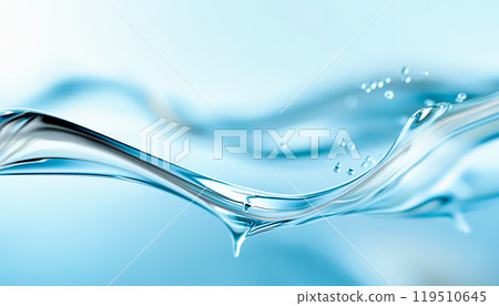 Clear water flows gracefully in soft light, creating tranquil patterns that evoke a sense of calm and peace. 119510645