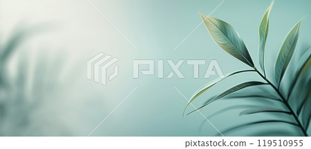 Delicate green leaves reach out gracefully, set against a softly blurred blue backdrop, creating a tranquil and calming atmosphere. Delicate green leaves reach out gracefully, set against a softly blurred blue backdrop, creating a tranquil and calming atmosphere. 119510955