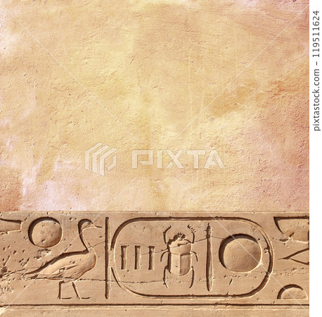 Vertical background with ancient Egyptian hieroglyphs on stone wall, Egypt, Africa. Backdrop with sandstone carving with hieroglyph. Mock up template. Copy space for text Vertical background with ancient Egyptian hieroglyphs on stone wall, Egypt, Africa. Backdrop with sandstone carving with hieroglyph. Mock up template. Copy space for text 119511624