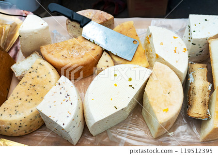 Cheese Wheels for Sale at the Counter Cheese Wheels for Sale at the Counter 119512395